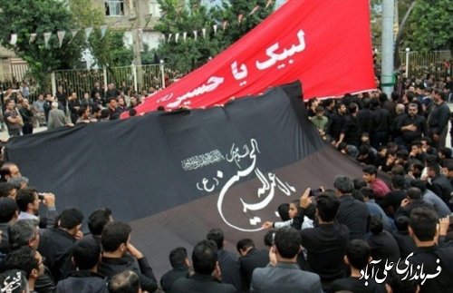 اهتزاز پرچم بزرگ عزای «امام حسین» در علی آباد کتول  